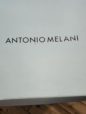 ANTONIO MELANI White Box with Black Logo